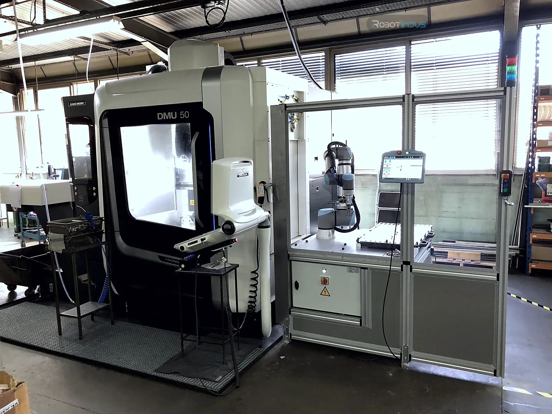 Cellule cobotisée de chargement de machines-outils